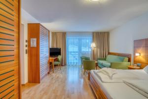 Postel nebo postele na pokoji v ubytování Hotel Cevedale