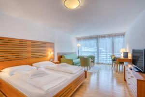 Postel nebo postele na pokoji v ubytování Hotel Cevedale