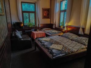 Postel nebo postele na pokoji v ubytování Penzion Rudolf