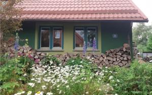Vonkajšia záhrada v ubytovaní Zielony Domek w Sztynorcie