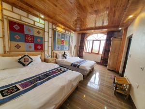 Postel nebo postele na pokoji v ubytování Huân Đậu Đậu Homestay