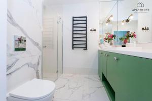 Kúpeľňa v ubytovaní Rezydencja Wintera by Apartmore + 3 fotografie