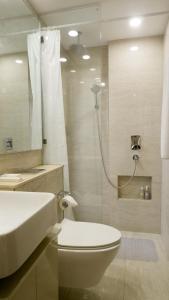Koupelna v ubytování RELOhomes Serviced Apartment