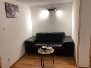 Posedenie v ubytovaní Apartamenty MOŁS Zakopane