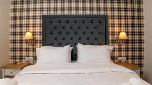 Posteľ alebo postele v izbe v ubytovaní Brettania Hotel