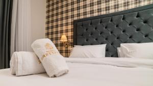 Posteľ alebo postele v izbe v ubytovaní Brettania Hotel