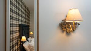 Posteľ alebo postele v izbe v ubytovaní Brettania Hotel