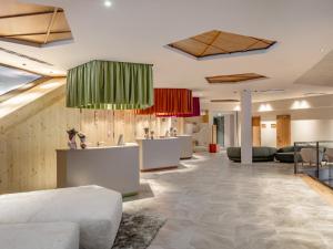 Falkensteiner Family Hotel Montafon - The Leading Hotels of the World的休息区