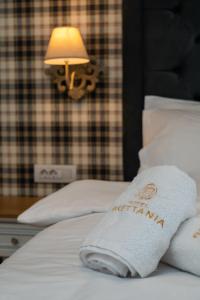 Posteľ alebo postele v izbe v ubytovaní Brettania Hotel
