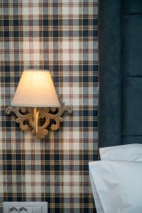 Posteľ alebo postele v izbe v ubytovaní Brettania Hotel