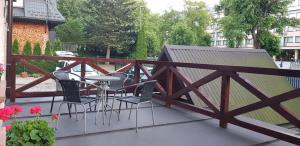 Balkón alebo terasa v ubytovaní Apartamenty MOŁS Zakopane
