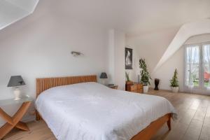 Posteľ alebo postele v izbe v ubytovaní Grande maison à 1 km de la mer au Pouliguen !