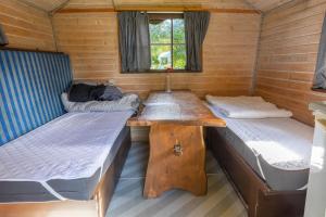 Postel nebo postele na pokoji v ubytování Egtved Camping Cottages
