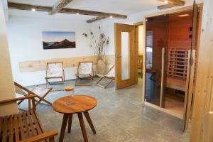 a tasting room with chairs and a table at MY APARTMENT krinzwald in Seefeld in Tirol