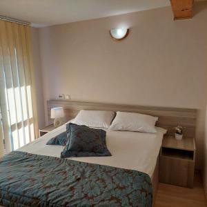 Postel nebo postele na pokoji v ubytování Guest House Planinski Zdravets