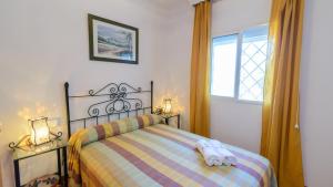 Posteľ alebo postele v izbe v ubytovaní Alba Antequera - La Higuera by Ruralidays + 14 fotografií