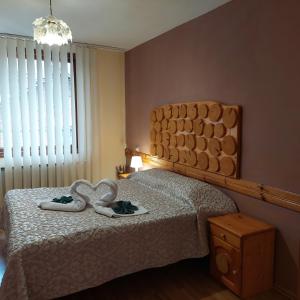 Postel nebo postele na pokoji v ubytování Guest House Planinski Zdravets