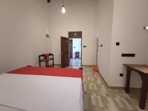Postel nebo postele na pokoji v ubytování Sara Place