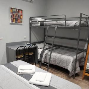 Postel nebo postele na pokoji v ubytování Hotel Convertini
