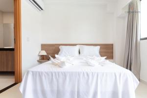 Cama ou camas em um quarto em Mana Beach #C112 - Para 3 Pessoas por Carpediem