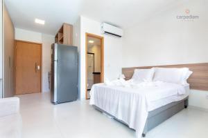 Cama ou camas em um quarto em Mana Beach #C112 - Para 3 Pessoas por Carpediem mais 36 fotos