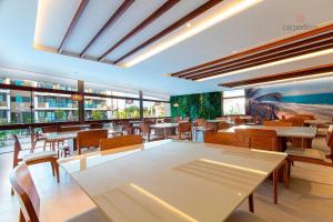 Um restaurante ou outro lugar para comer em Mana Beach #C112 - Para 3 Pessoas por Carpediem