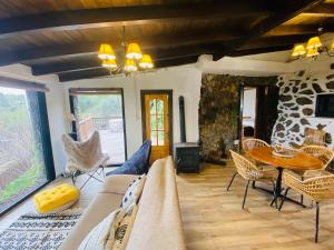 a living room with a couch and a table at Finca maestra in Los Llanos