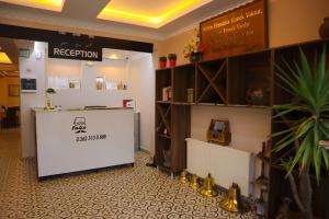 a room with a reception counter in a building at Osmanlı Paşa Otel- Konaklama in Samsun