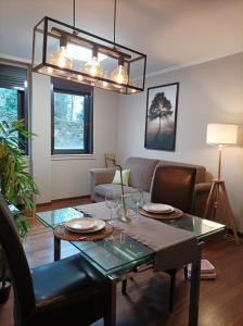 Posezení v ubytování Apartamento Piscina 1G by Urraca Suites Viveiro