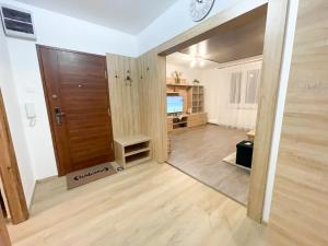 TV a/nebo společenská místnost v ubytování Apartman Anita + 27 fotografií