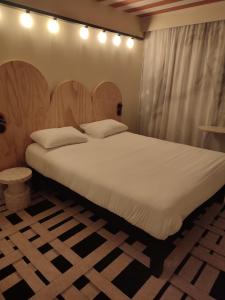 Ένα ή περισσότερα κρεβάτια σε δωμάτιο στο ibis Styles Montauban