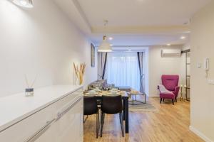 Posedenie v ubytovaní REZYDENCJA ORNAK 5 - stylowe apartamenty z balkonami i jacuzzi, 5 min pieszo do Krupówek, IZBY PODHALAŃSKIE
