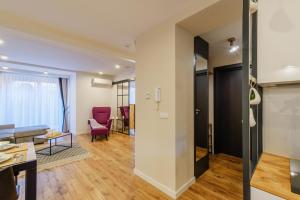 Posedenie v ubytovaní REZYDENCJA ORNAK 5 - stylowe apartamenty z balkonami i jacuzzi, 5 min pieszo do Krupówek, IZBY PODHALAŃSKIE
