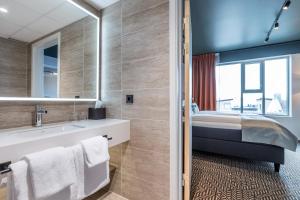Postel nebo postele na pokoji v ubytování Quality Hotel Prinsen