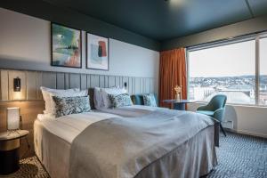 Postel nebo postele na pokoji v ubytování Quality Hotel Prinsen