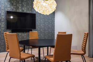 TV a/nebo společenská místnost v ubytování Quality Hotel Prinsen