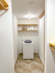 - une buanderie avec un lave-linge et un sèche-linge dans l'établissement Casa Al Mare Preá, à Prea 15 autres photos