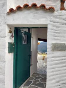 Fotografia z galérie ubytovania Xenia's Traditional House v destinácii Andros