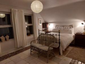 Katil atau katil-katil dalam bilik di Stunning apartment set in private native woodland