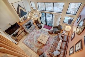 an overhead view of a living room with a chandelier at Village Point in Breckenridge