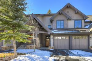 a large house with a garage at Mountain Thunder #604 in Breckenridge