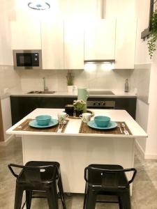 A kitchen or kitchenette at Apartamento Cádiz Costa