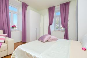 Postel nebo postele na pokoji v ubytování Spacious 4 Bedroom Dubrovnik Apartment