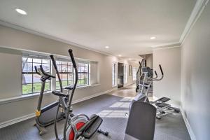 a gym with three exercise bikes in a room at Immaculate Woodland View Retreat with Hot Tub in Tulsa