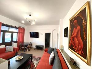 A television and/or entertainment centre at Classic 2 Bedroom Apartment Next to Metro - Marousi
