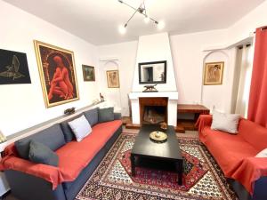 A television and/or entertainment centre at Classic 2 Bedroom Apartment Next to Metro - Marousi