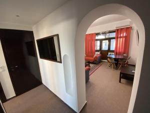 A television and/or entertainment centre at Classic 2 Bedroom Apartment Next to Metro - Marousi