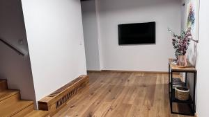TV a/nebo společenská místnost v ubytování Apartmán na Pasekách