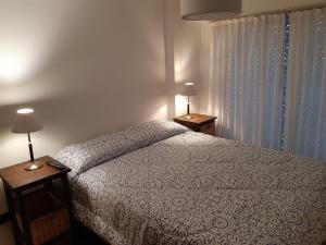 Llit o llits en una habitació de Departamento 4/5 PAX a 120 mts del mar- Necochea