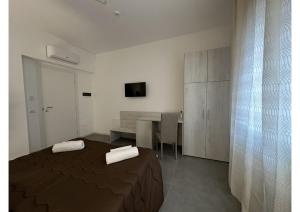 Postel nebo postele na pokoji v ubytování GIROOMS B&B